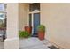 A welcoming entrance with planters flanking the door at 5309 W Angela Dr, Glendale, AZ 85308