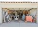 Spacious garage interior, providing ample storage and workspace for various projects and equipment at 5309 W Angela Dr, Glendale, AZ 85308