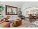 Open living room featuring hardwood floors and view to a dining area at 5309 W Angela Dr, Glendale, AZ 85308