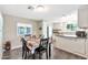 Charming dining area with stylish table and chairs adjacent to the kitchen at 5402 E Mckellips Rd # 298, Mesa, AZ 85215