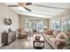 Spacious living room with comfortable seating and a bay window for ample sunlight at 5402 E Mckellips Rd # 298, Mesa, AZ 85215