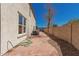 Large backyard patio offering ample space, privacy walls, and easy outdoor maintenance at 5430 S 23Rd Way, Phoenix, AZ 85040