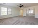 Bright bedroom featuring ample natural light, carpet floors, and a spacious layout at 5430 S 23Rd Way, Phoenix, AZ 85040