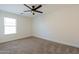 Bedroom featuring neutral tones, plush carpet, ceiling fan and natural light at 5430 S 23Rd Way, Phoenix, AZ 85040