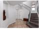 Bright foyer features tile flooring and a staircase, creating an inviting entrance to the home at 5430 S 23Rd Way, Phoenix, AZ 85040