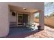 Covered patio with seating provides an ideal outdoor space for dining and relaxation at 5430 S 23Rd Way, Phoenix, AZ 85040