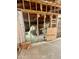 Unfinished basement area shows the frame of the house and floor with construction materials at 5550 E Shea Blvd, Scottsdale, AZ 85254