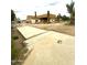View of the exterior property under construction with dirt and cement base at 5550 E Shea Blvd, Scottsdale, AZ 85254