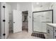 Bright bathroom with a spacious walk-in shower and a convenient walk-in closet at 5712 S Parkwood --, Mesa, AZ 85212