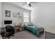 Comfortable bedroom with a desk and shelves, ideal for a student or guest at 5712 S Parkwood --, Mesa, AZ 85212