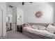A cute bedroom features a daybed and a walk-in closet, offering versatility and storage space at 5712 S Parkwood --, Mesa, AZ 85212