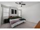 Minimalist style main bedroom featuring a neutral color scheme, plush carpet and natural light at 5712 S Parkwood --, Mesa, AZ 85212