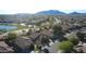 Community aerial view featuring single Gathering homes that are surrounded by trees and green space with mountain views at 6071 S Topaz Pl, Chandler, AZ 85249