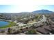 Aerial view showing the houses that are interspersed in a sprawling community surrounded by green at 6071 S Topaz Pl, Chandler, AZ 85249