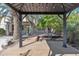 Inviting backyard showcasing a gazebo with a cozy deck, lush landscaping, and a serene escape at 6071 S Topaz Pl, Chandler, AZ 85249