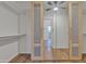 Walk-in closet featuring built in shelving, and mirrored doors, offering great storage potential at 6071 S Topaz Pl, Chandler, AZ 85249
