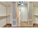 Spacious closet with floor to ceiling mirrored doors, complemented by wood-look flooring at 6071 S Topaz Pl, Chandler, AZ 85249