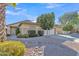 Charming single-story home featuring desert landscaping, a tile roof, and a well-maintained two-car garage at 6071 S Topaz Pl, Chandler, AZ 85249