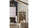 Close up of living room details, including a modern fireplace, built-in shelves, and comfortable seating at 6147 E Desert Cove Ave, Scottsdale, AZ 85254
