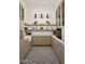 Charming pantry with ample shelving, custom cabinets, herringbone floors, and contrasting bronze hardware at 6147 E Desert Cove Ave, Scottsdale, AZ 85254