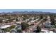 Aerial view of neighborhood homes surrounded by lush greenery and mountain views at 6529 E Voltaire Ave, Scottsdale, AZ 85254