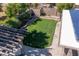 Aerial view showcasing backyard with lawn and pergola at 6529 E Voltaire Ave, Scottsdale, AZ 85254