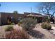 Inviting home with low-maintenance desert landscaping and charming desert-style plants at 6529 E Voltaire Ave, Scottsdale, AZ 85254