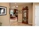 Hallway with decor and open view into living spaces and kitchen at 6529 E Voltaire Ave, Scottsdale, AZ 85254
