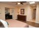 Bedroom with desk, wood floors, and light paint scheme at 6529 E Voltaire Ave, Scottsdale, AZ 85254