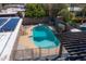 Aerial view of backyard pool with a safety fence and pergola at 6529 E Voltaire Ave, Scottsdale, AZ 85254