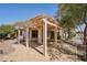 Spacious covered patio with pergola, perfect for outdoor entertaining and relaxing at 6659 W Oraibi Dr, Glendale, AZ 85308