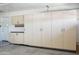Garage cabinets provide ample storage, enhancing organization and functionality at 6659 W Oraibi Dr, Glendale, AZ 85308