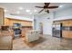 Bright kitchen featuring stainless steel appliances, granite counters, and tile flooring at 6659 W Oraibi Dr, Glendale, AZ 85308