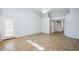 Living space with a ceiling fan, tile floors, and easy access to the backyard at 6659 W Oraibi Dr, Glendale, AZ 85308