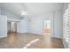 This main bedroom has lots of space, tile floors, and a bright bathroom at 6659 W Oraibi Dr, Glendale, AZ 85308