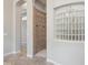 Walk in shower features neutral tile and glass block window at 7201 E Sandia Cir, Mesa, AZ 85207