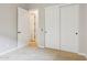 Bedroom with neutral paint, carpet and white closet doors at 7201 E Sandia Cir, Mesa, AZ 85207