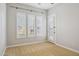 A light-filled bedroom with white shutters on the windows at 7201 E Sandia Cir, Mesa, AZ 85207