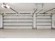 Garage doors for a two-car garage at 7201 E Sandia Cir, Mesa, AZ 85207
