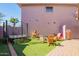 Beautiful backyard featuring a trampoline, slide, and basketball hoop at 7650 E Williams Dr # 1011, Scottsdale, AZ 85255