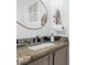 Stylish bathroom vanity with granite countertop and modern fixtures at 7650 E Williams Dr # 1011, Scottsdale, AZ 85255