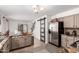 Bright kitchen showcasing stainless steel appliances, granite countertops, and access to a dining area at 7650 E Williams Dr # 1011, Scottsdale, AZ 85255