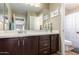 Well maintained bathroom with modern accents with a large mirror over the vanity at 811 E Gold Dust Way, San Tan Valley, AZ 85143