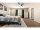 Cozy bedroom featuring neutral walls, carpeted floors, and a plush bed at 811 E Gold Dust Way, San Tan Valley, AZ 85143