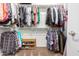 A fully organized closet with shelves and racks provides ample storage space at 811 E Gold Dust Way, San Tan Valley, AZ 85143