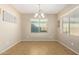 Bright dining room with natural light and tile flooring at 811 E Gold Dust Way, San Tan Valley, AZ 85143