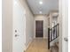 Bright entryway featuring tiled floors, a staircase, and a glimpse into adjacent rooms, offering a warm welcome at 811 E Gold Dust Way, San Tan Valley, AZ 85143