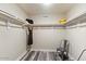 Walk in closet with lots of storage space and wood look flooring at 8209 E Heatherbrae Ave, Scottsdale, AZ 85251