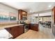 Bright kitchen with granite countertops, stainless steel appliances, and plenty of cabinet space at 8209 E Heatherbrae Ave, Scottsdale, AZ 85251