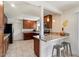 Well-equipped kitchen featuring granite countertops, stainless steel appliances, and ample storage space at 8209 E Heatherbrae Ave, Scottsdale, AZ 85251